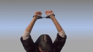 A woman in handcuffs | How To Punish A Greedy And Cunning Girlfriend – Part 4