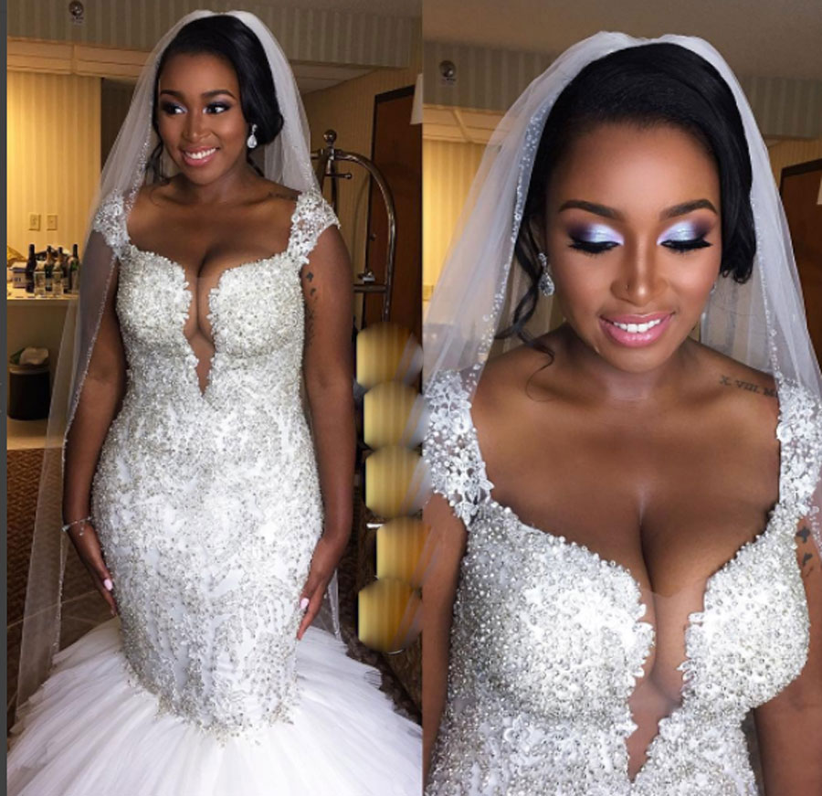 a black woman in her wedding gown