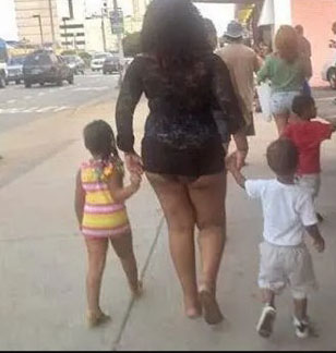 an indecently dressed woman holding her indecently dressed baby-girl and son | 6 Important Things Women Must Know About Indecent Dressing